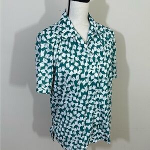 Vicki. Wayne’s sz 10 silky feel blouse. White with a small green print